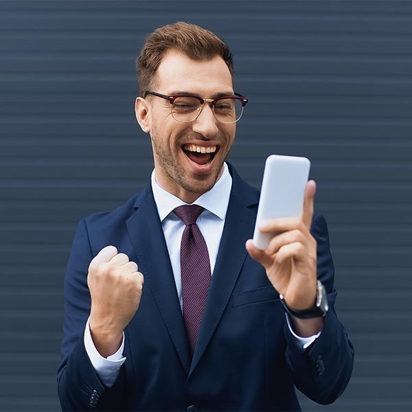 Happy guy with reliable phone systems