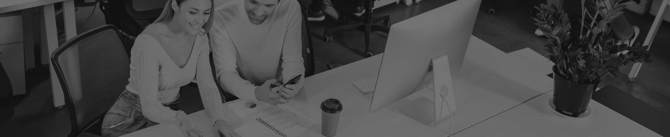 people working in office black and white 2